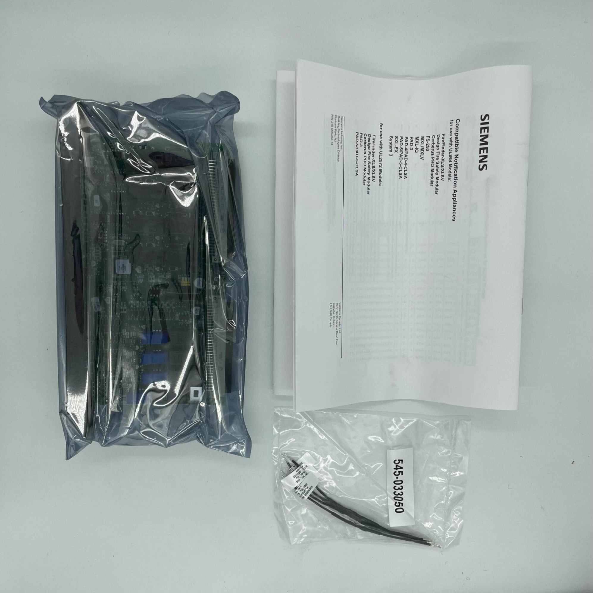 Siemens ZIC-4A NAC system with control unit and wiring, used for industrial or security applications.