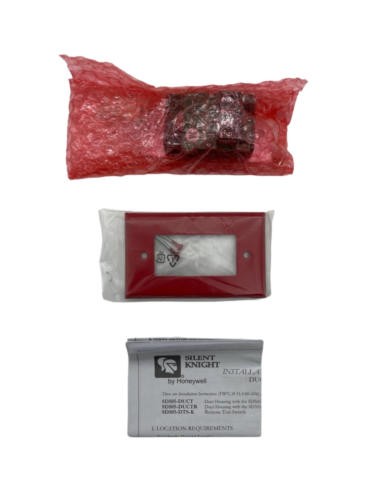 Silent Knight SD505-DTS-K remote test switch for security alarm systems, shown in the image with buttons and display.