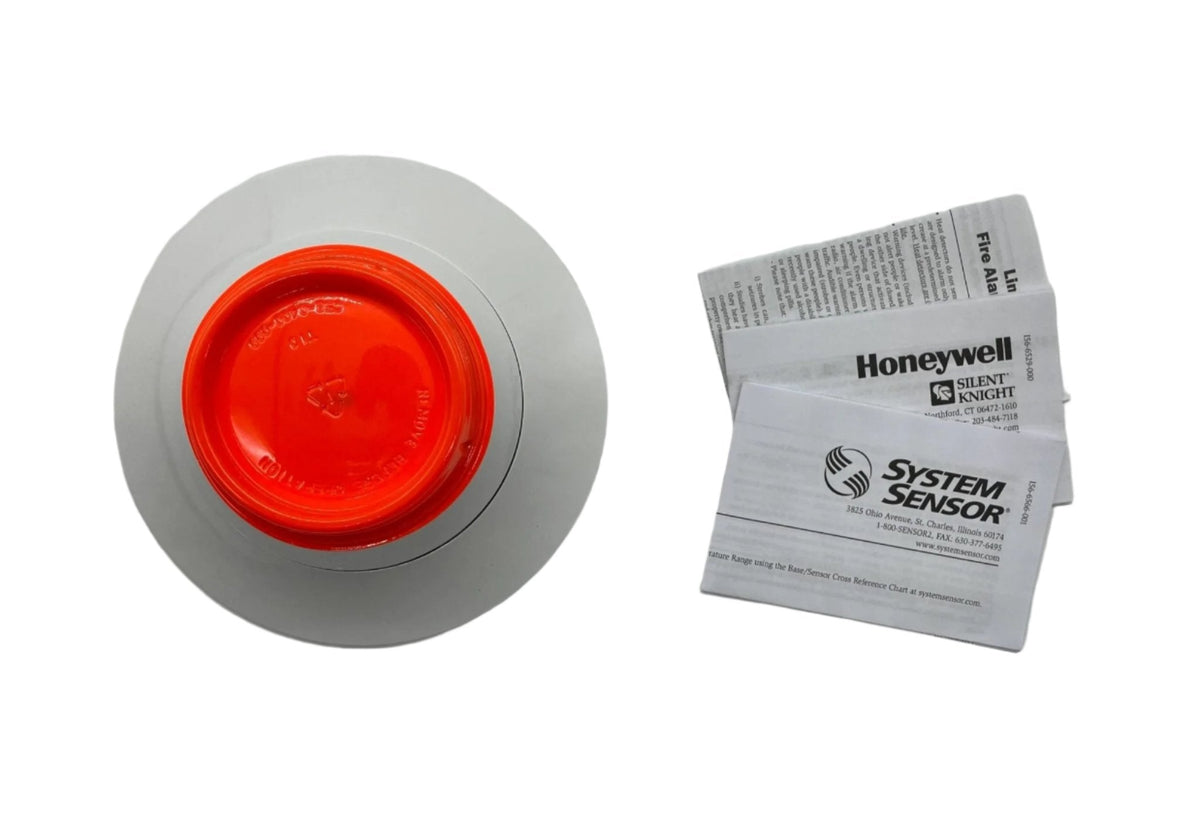 Silent Knight SK-HEAT-HT-W addressable heat detector with white housing, designed for fire safety and temperature monitoring