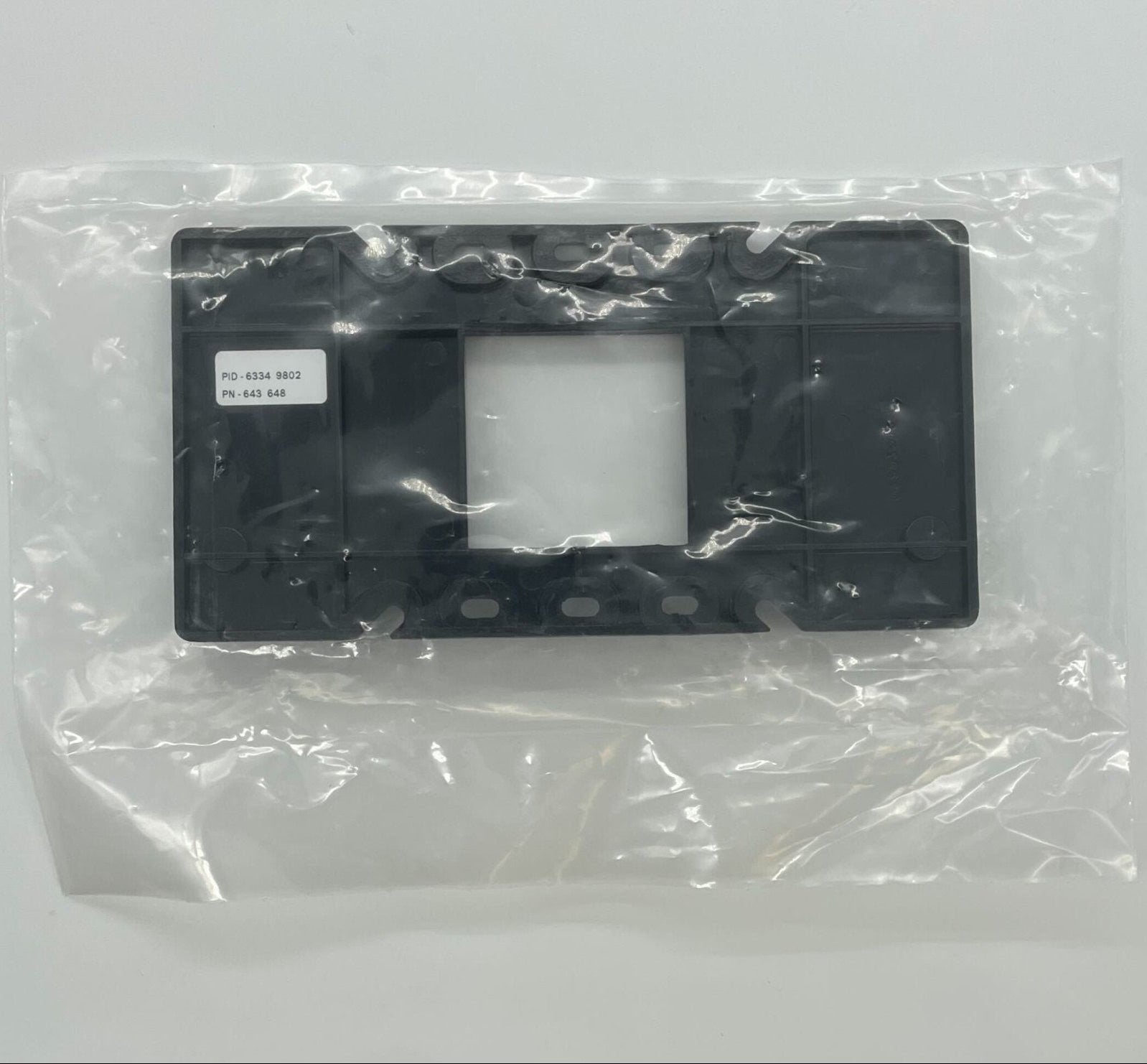 Simplex 6334-9802 fire alarm sensor with ULC certification, mounted on wall, part of fire alarm system by Simplex.
