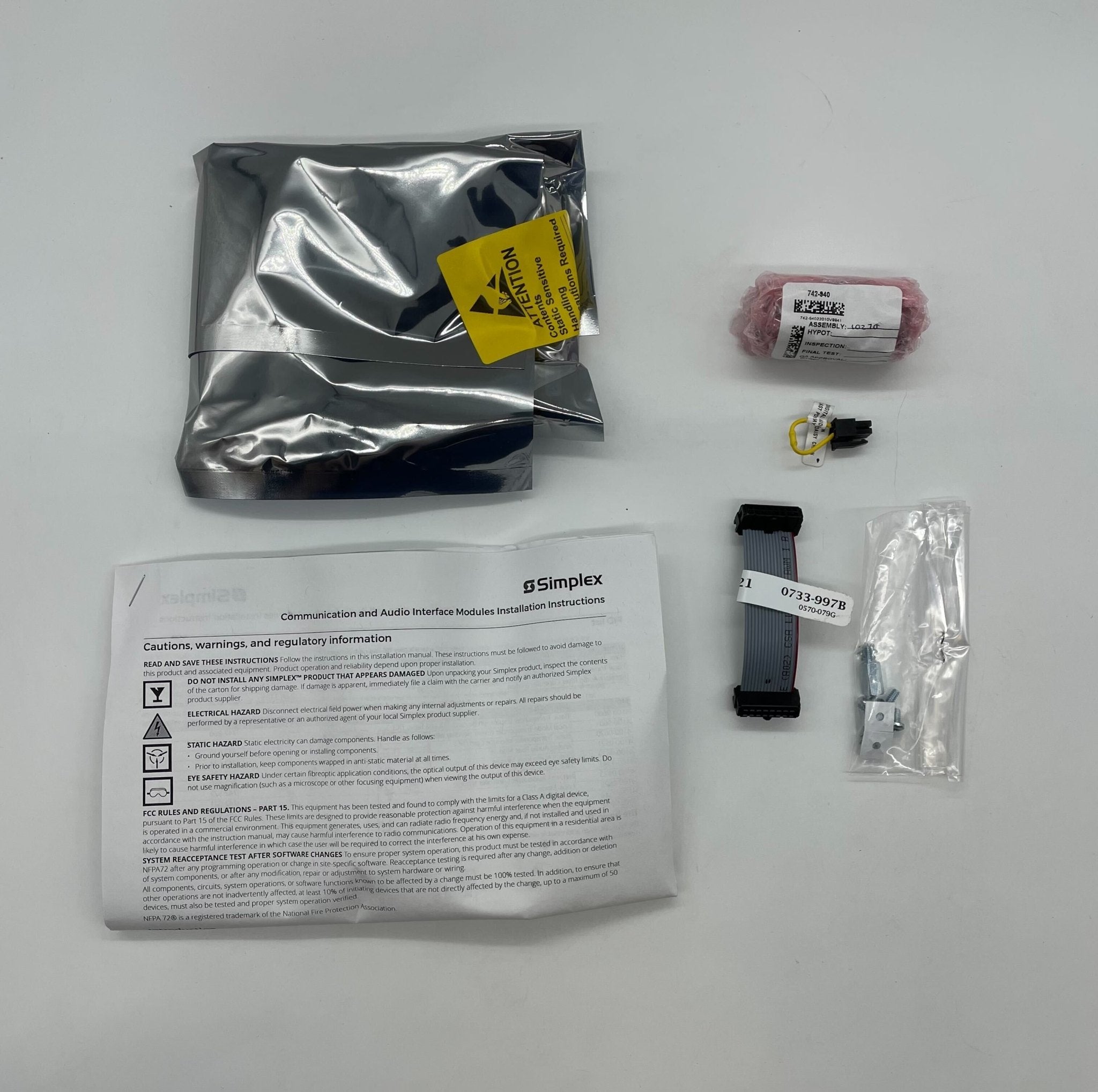 Simplex 4100-0622 audio unit, a compact device with controls and connectors, designed for communication systems.