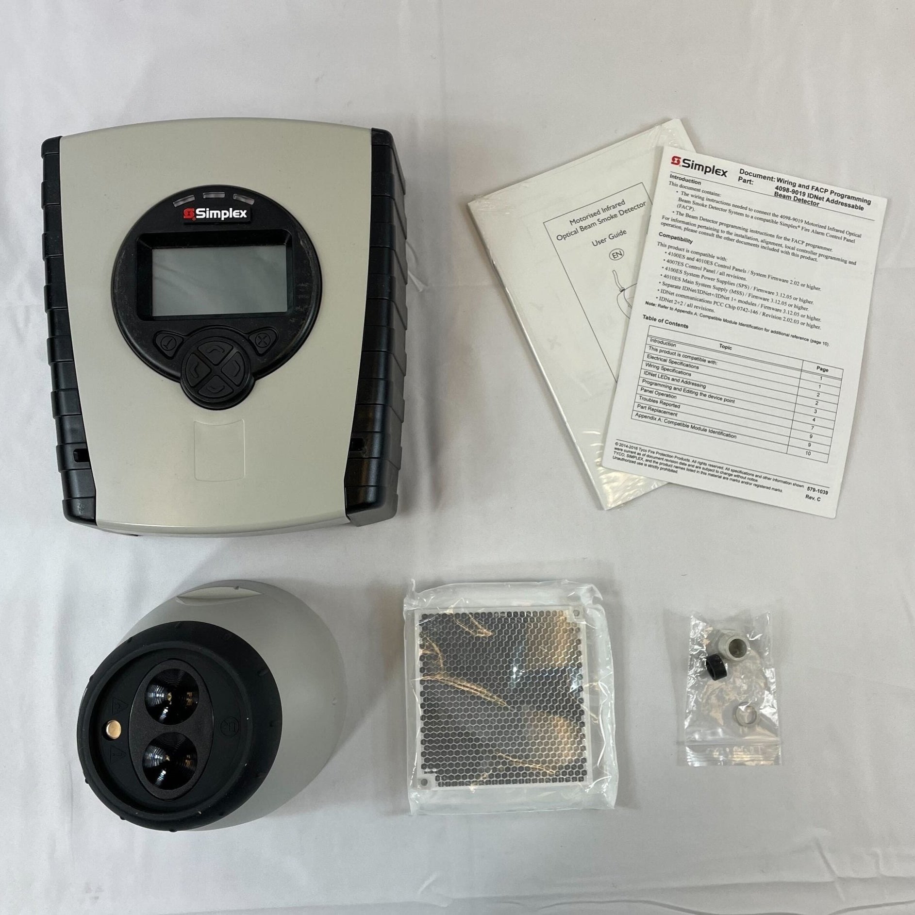 Simplex 4098-9019 fire alarm sensor, ULC certified, mounted on ceiling for smoke detection in commercial fire safety system