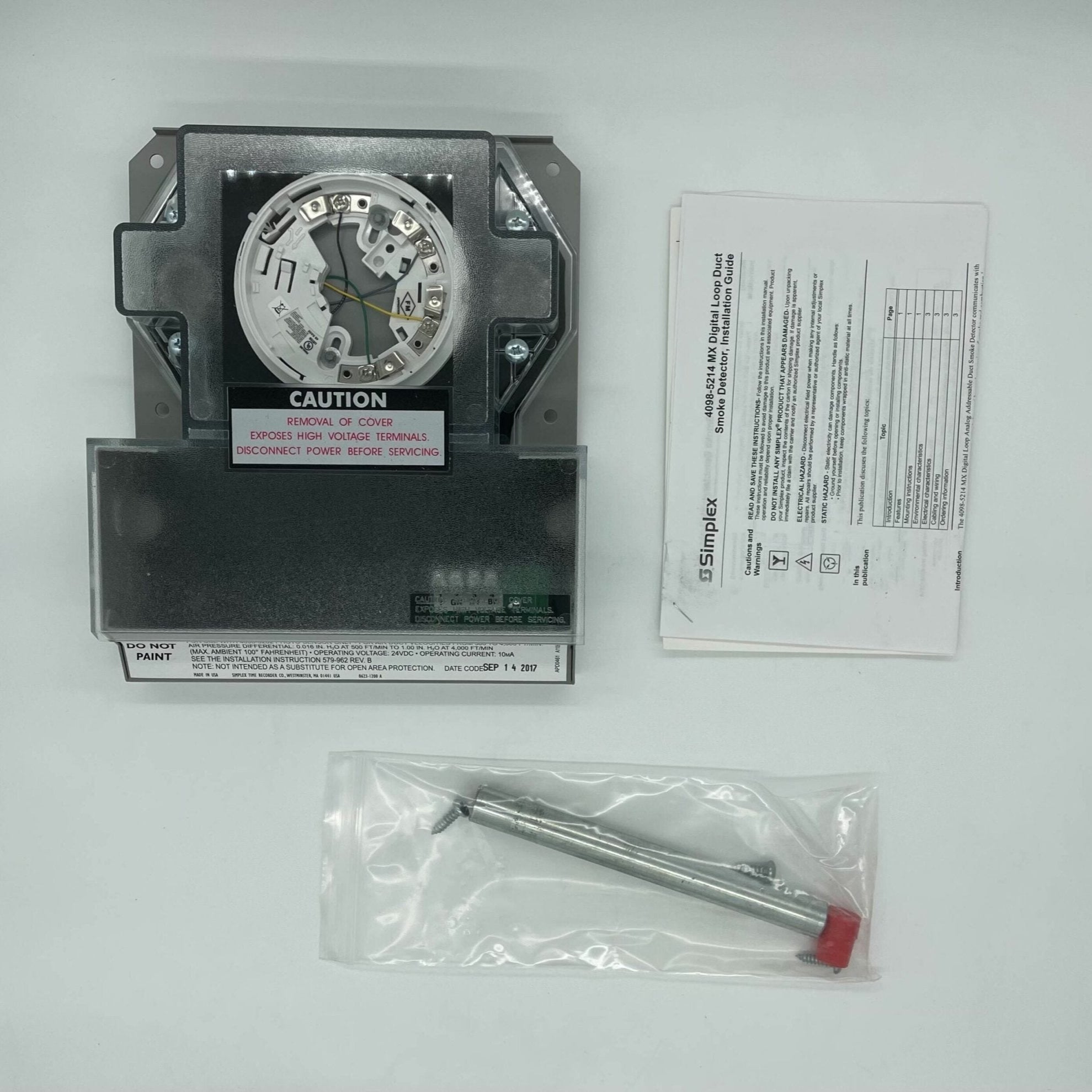 Simplex 4098-5214 duct detector installed in a ceiling, part of Simplex fire detection system for HVAC safety.