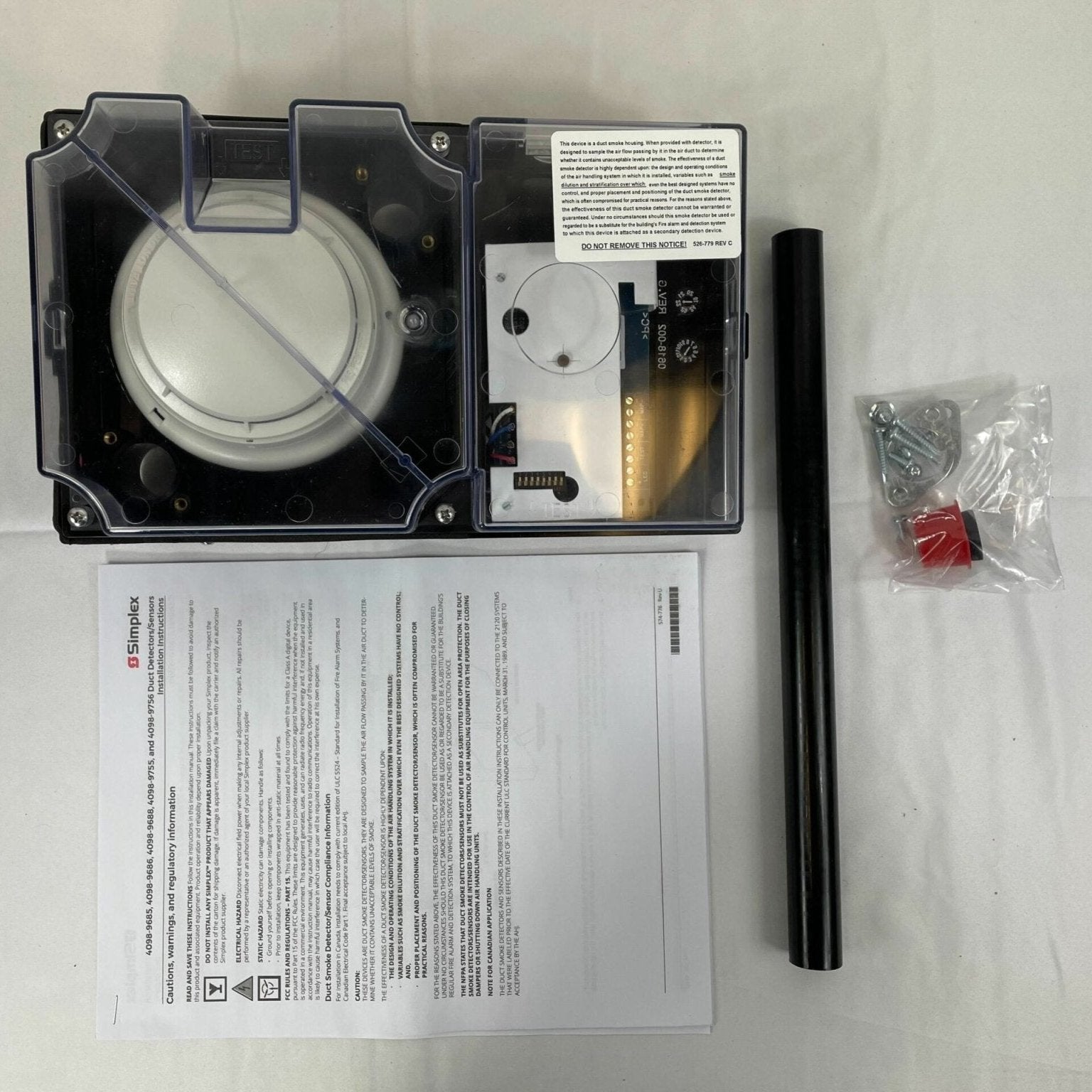 Simplex 4098-9755 duct detector mounted on a ceiling, part of Simplex fire detection system for HVAC safety.