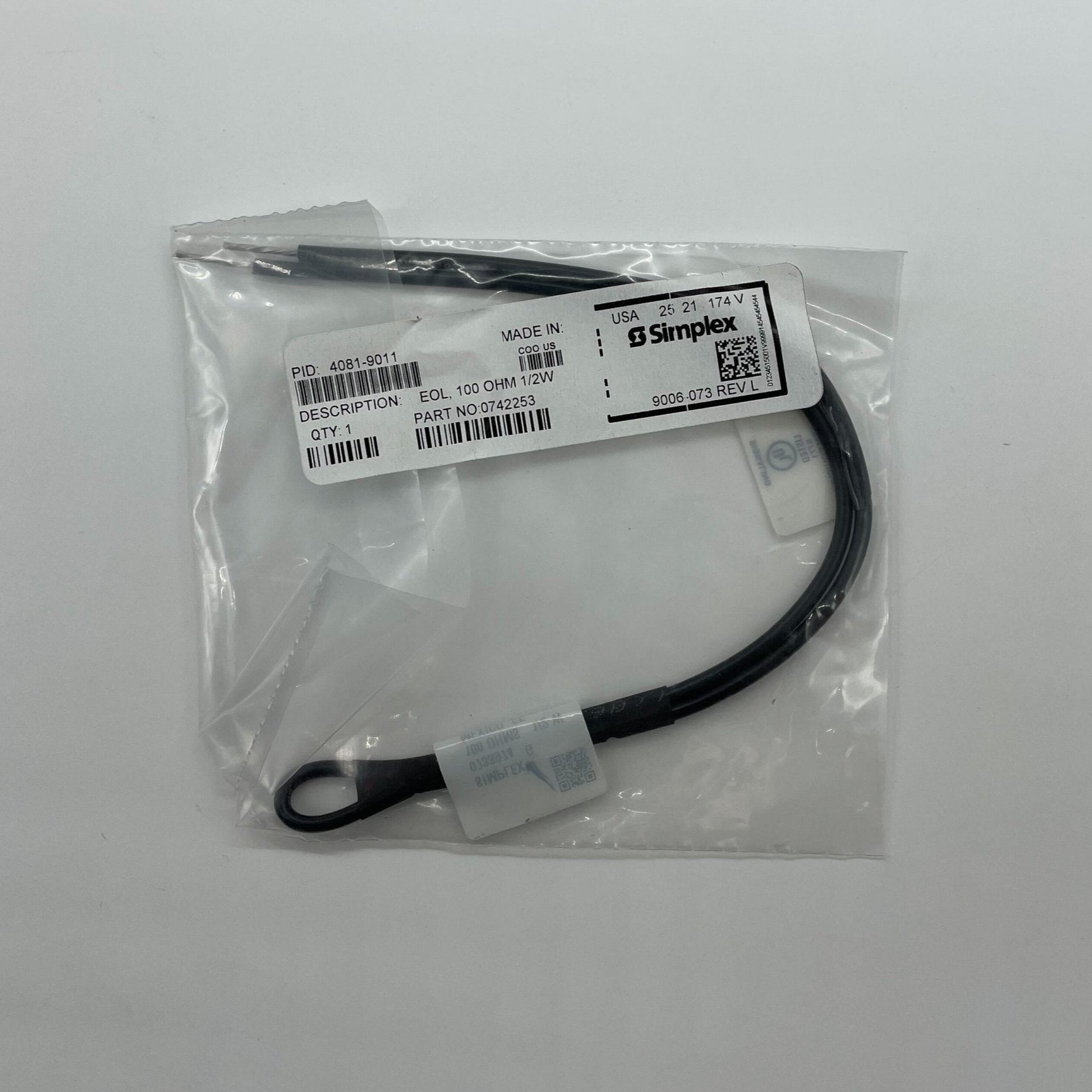 Simplex 4081-9011 EOL resistor from Simplex, shown in a close-up with electrical components and wiring.