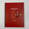 Simplex 2084-9018 fire alarm sensor from Simplex, mounted on a ceiling with wiring visible, in a safety system setup.