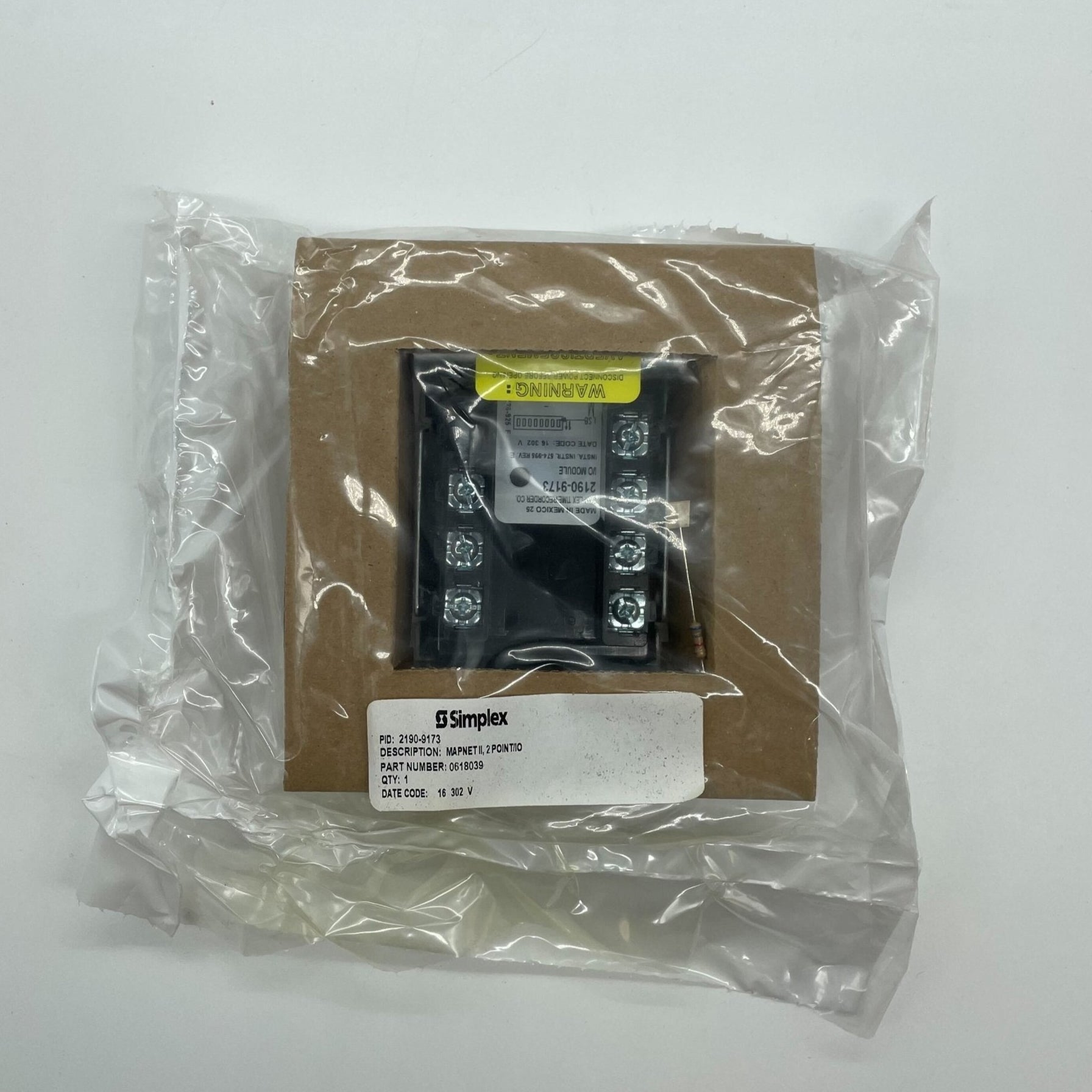 Simplex 2190-9173 fire alarm with a white, compact design, mounted on a wall, from Simplex, for fire safety and detection.