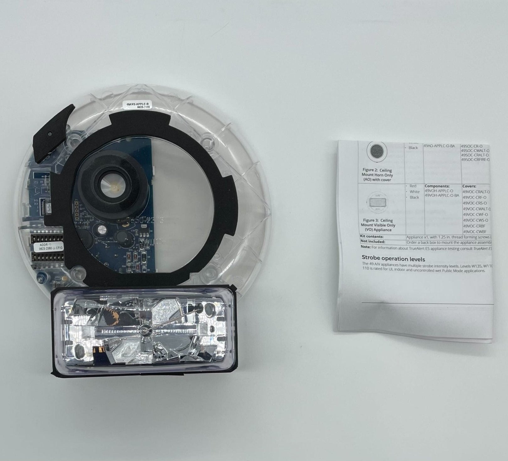 Simplex 49AVH-APPLC-O fire alarm with control panel, mounted on wall, featuring alarm indicators and wiring connections.