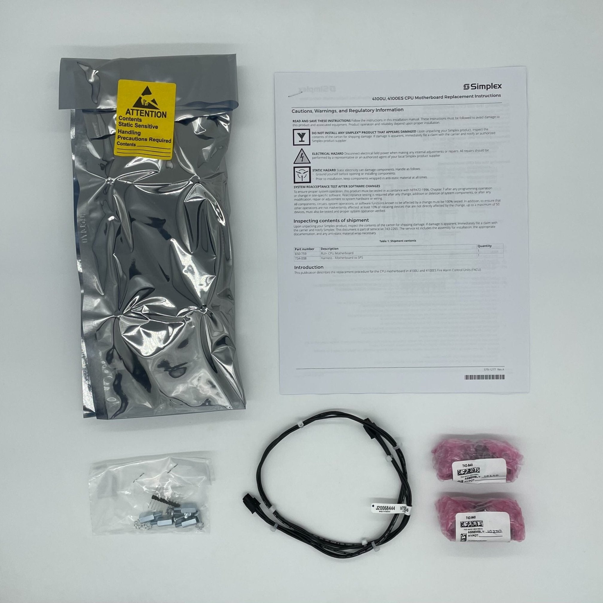 Simplex 743-2265 fire alarm sensor, ULC approved, mounted on wall with wiring, part of Simplex fire alarm system.