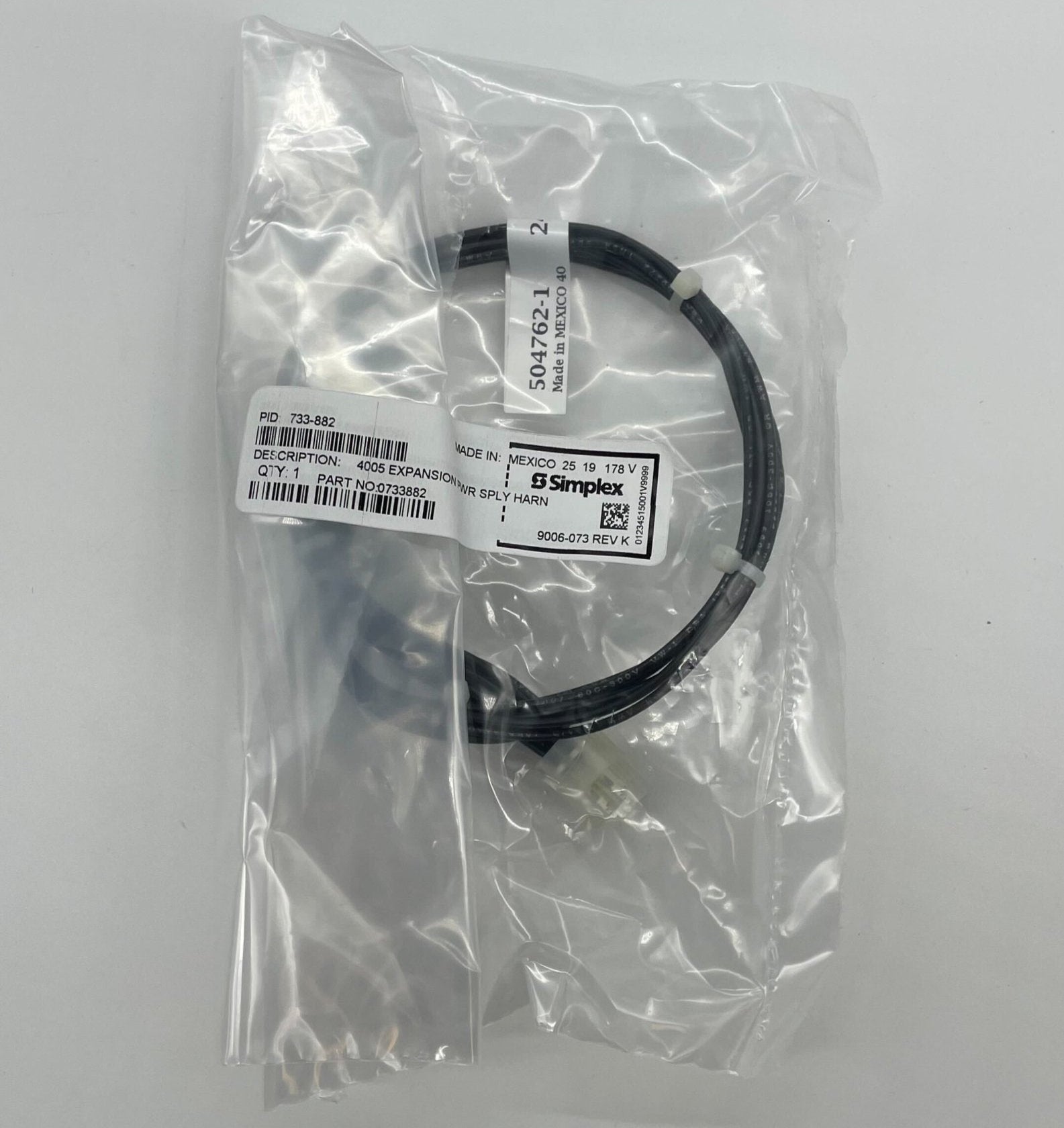 Simplex 733-882 fire alarm by Simplex, showing the alarm unit with mounting features on a white background.