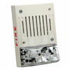 Simplex 4906-9130 horn strobe alarm with red housing and clear lens, mounted on a wall for fire alert signaling.