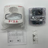 Simplex 49AV-WWFO-BA fire alarm device with white finish and alarm indicator, designed for building safety and fire detection.