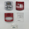 Simplex 49MTV-WRF-BA fire alarm device with wireless communication, mounted on wall, designed for safety and fire detection.