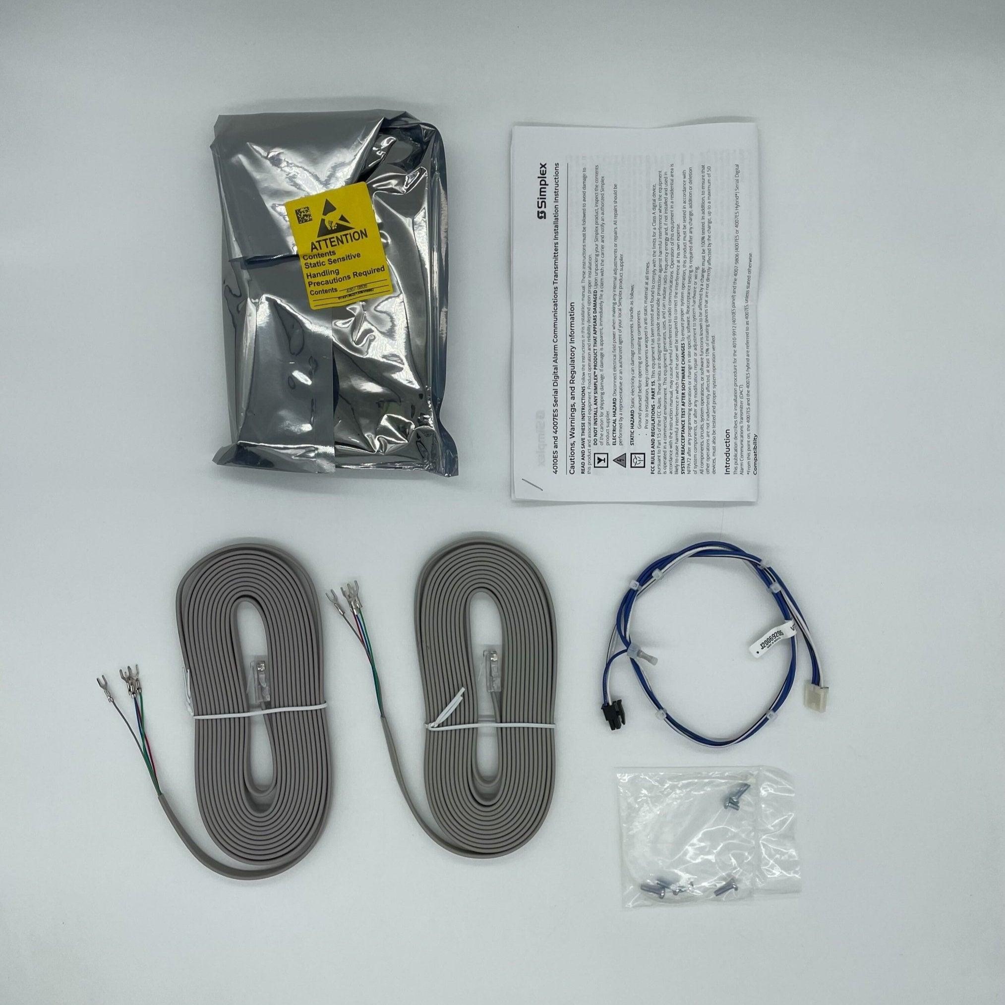 Simplex 4007-9806 fire alarm sensor, ULC certified, mounted on a ceiling, part of the Simplex fire alarm system.