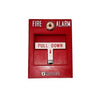 Simplex 2099-9102 pull station fire alarm switch mounted on wall with visible branding and safety labeling.