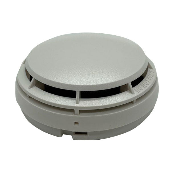 Simplex 4098-9714 photoelectric smoke detector mounted on ceiling, part of fire safety equipment from Simplex brand.