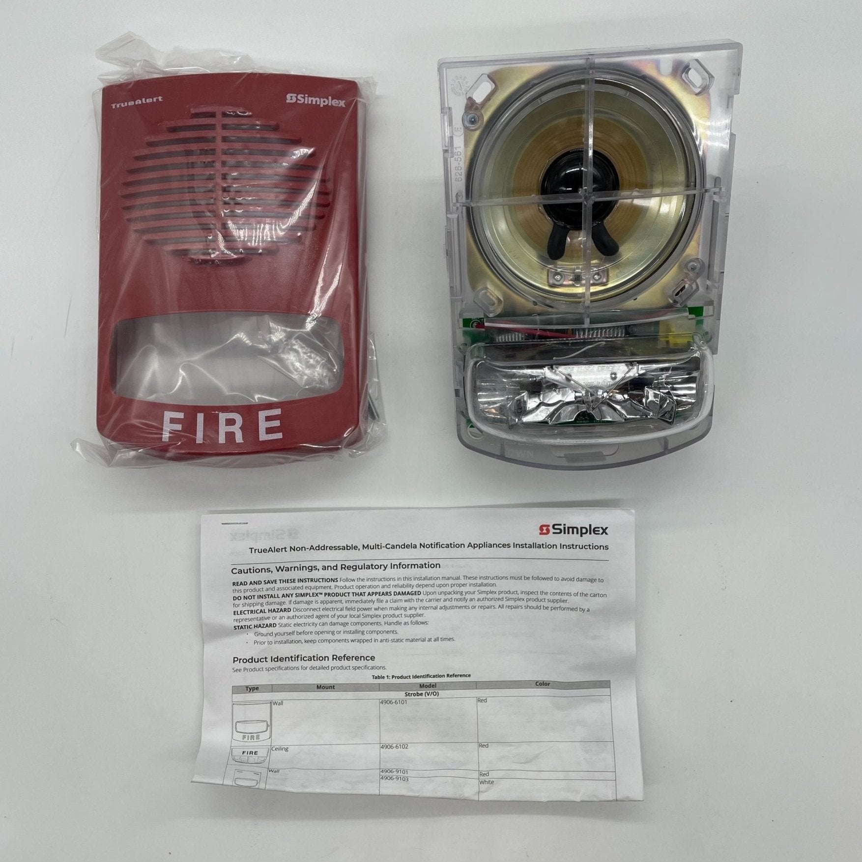 Simplex 4906-9151 speaker strobe light mounted on ceiling, white housing, designed for emergency warning systems.