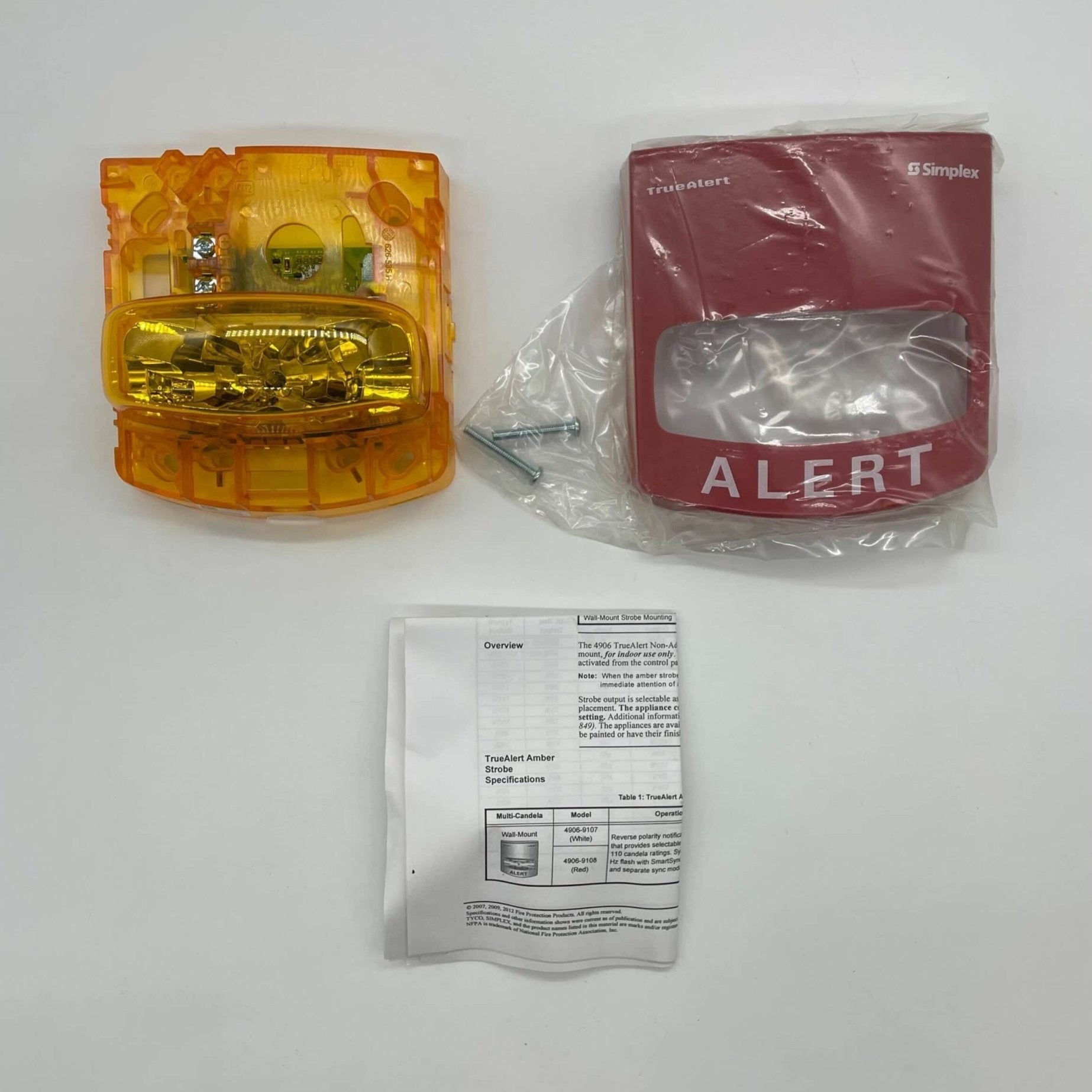 Simplex 4906-9108 fire alarm with a white plastic casing and mounting bracket, designed for fire detection and safety.