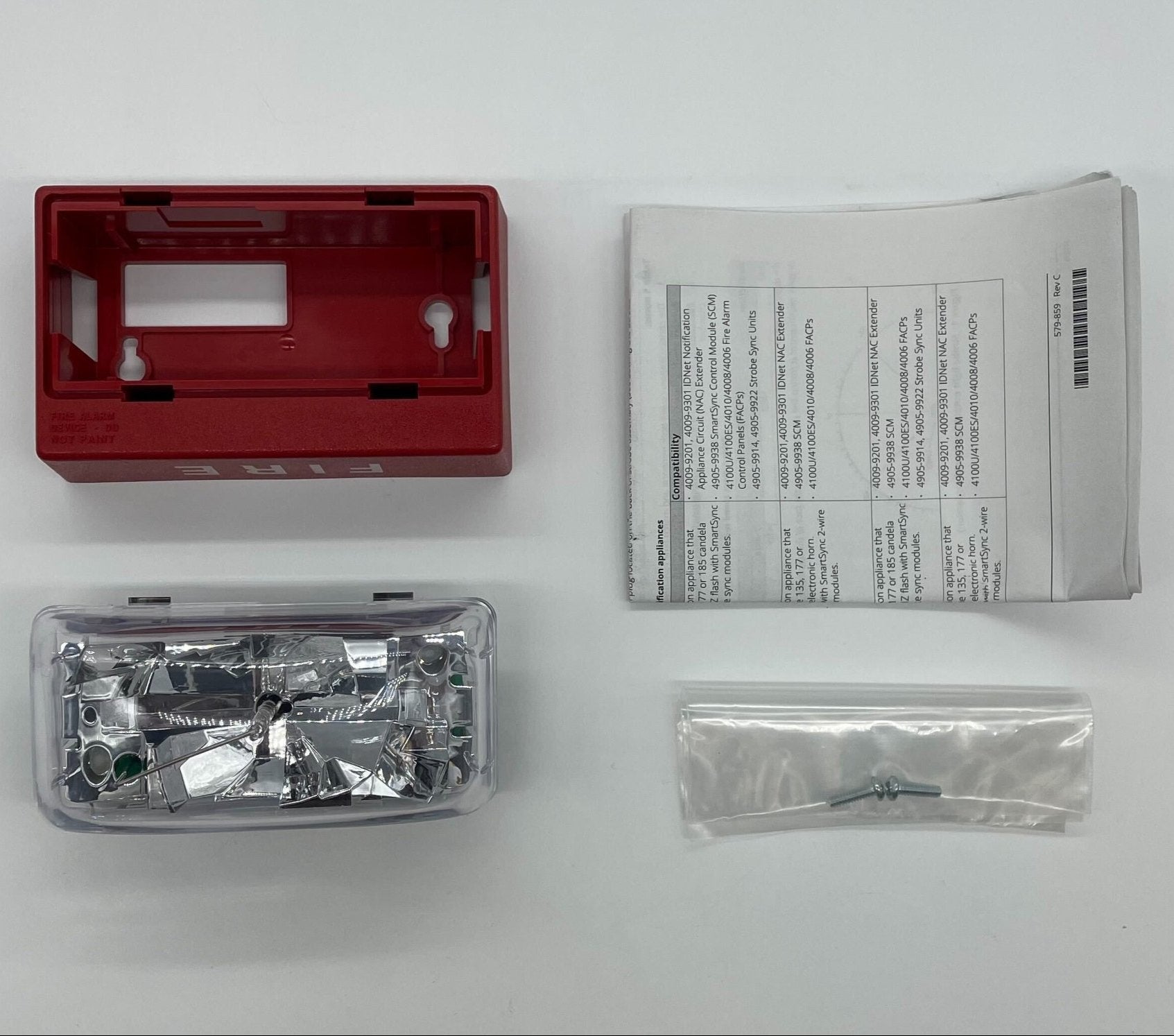 Simplex 4906-9110 fire alarm with white casing and mounting bracket, designed for building safety and emergency notification.