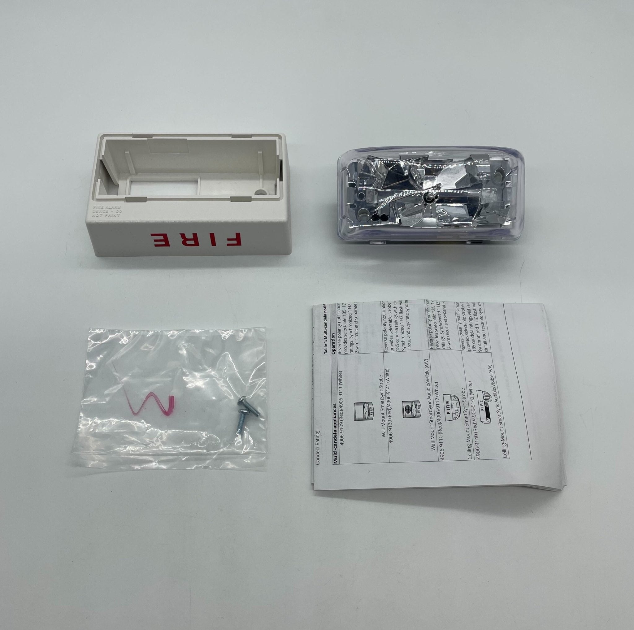 Simplex 4906-9112 fire alarm sensor, ULC certified, mounted on ceiling, part of the Simplex fire alarm system.