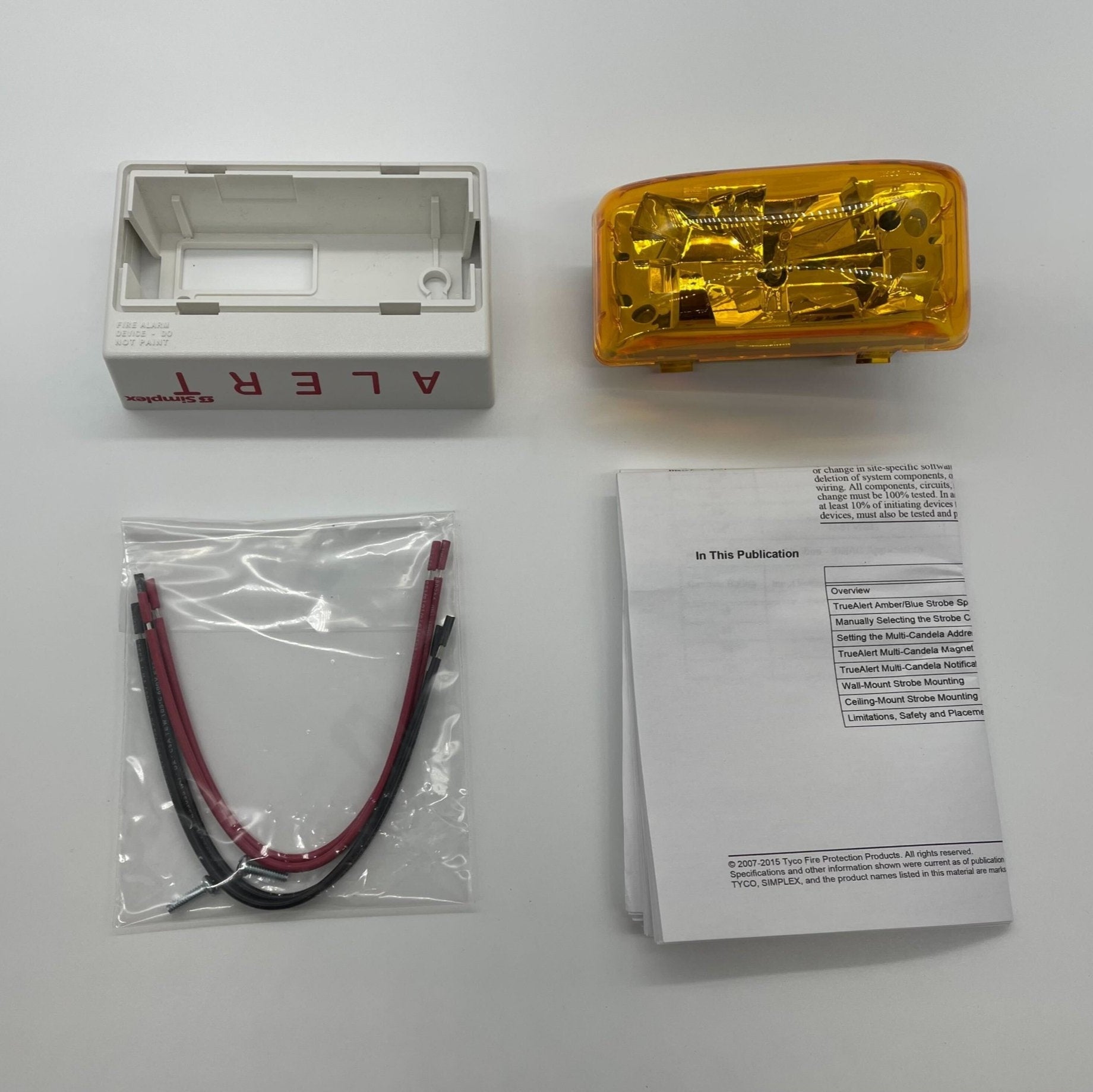 Simplex 4906-9207 fire alarm sensor with white plastic casing and mounting bracket, designed for fire safety systems.