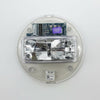 Simplex 49VO-APPLC strobe light, mounted on a wall, with clear lens and wiring visible, designed for emergency signaling.