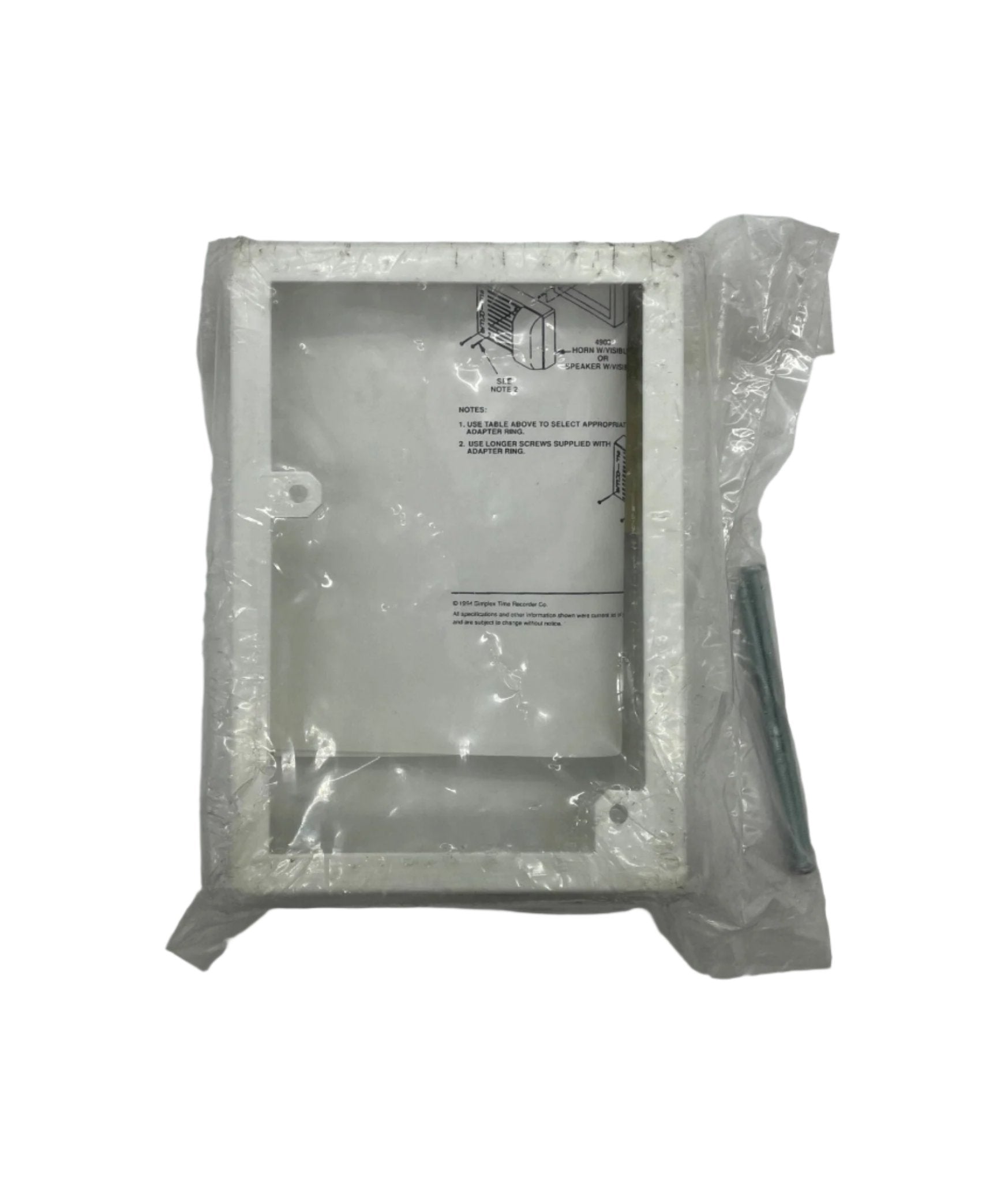 Simplex 4905-9915 fire alarm with alarm horn and sensor, mounted on a wall for fire safety.