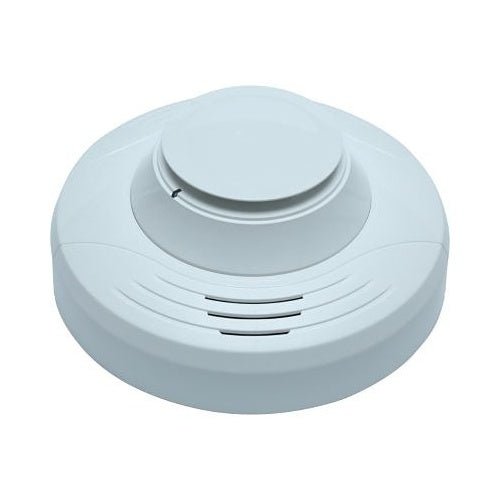 System Sensor SS-CO carbon monoxide detector with digital display and alarm, mounted on a wall in a home setting.