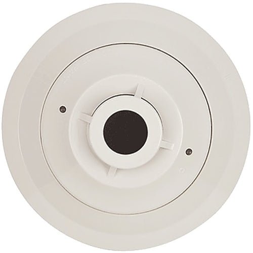 System Sensor 5251H heat detector with alarm module, mounted on a wall, designed for fire safety in commercial buildings.