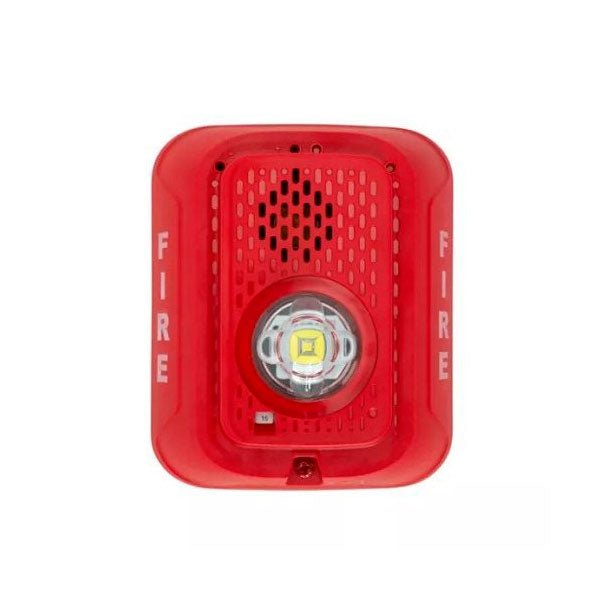 System Sensor P2RLED emergency exit sign with LED illumination, mounted on wall in a commercial setting.
