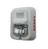 System Sensor P2WL-SP fire alarm with white rectangular design and test/silence buttons, mounted on a wall.