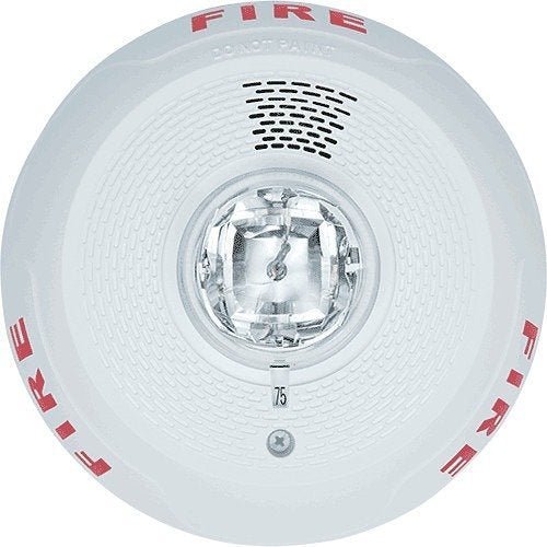 System Sensor PC2WL wireless carbon monoxide detector mounted on wall, showing digital display and sensor components.