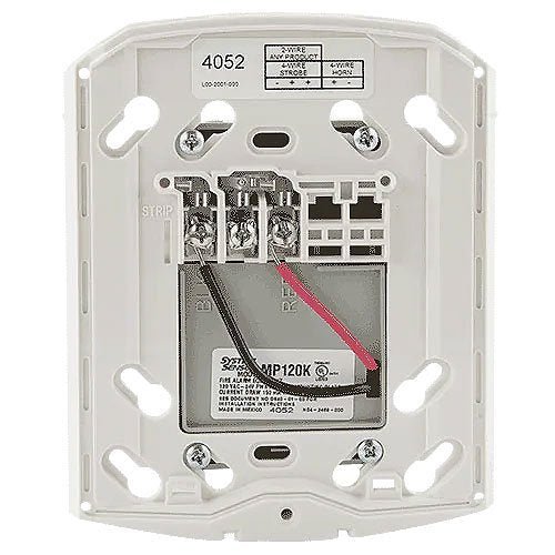 System Sensor MP120K fire alarm detector mounted on ceiling, showing its round shape and sensor components.