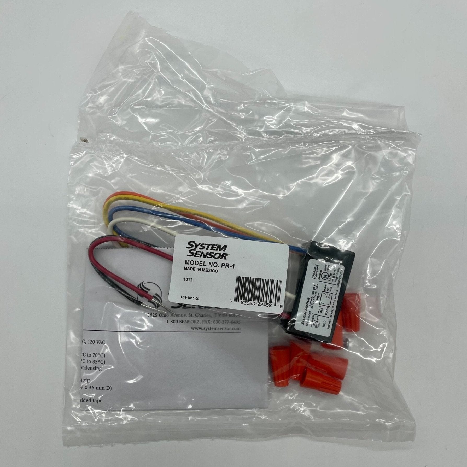 System Sensor PR-1 fire alarm detector mounted on ceiling in a commercial setting