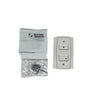 System Sensor RTS151 fire alarm sensor with wiring connector, mounted on a white panel, showcasing its compact design.