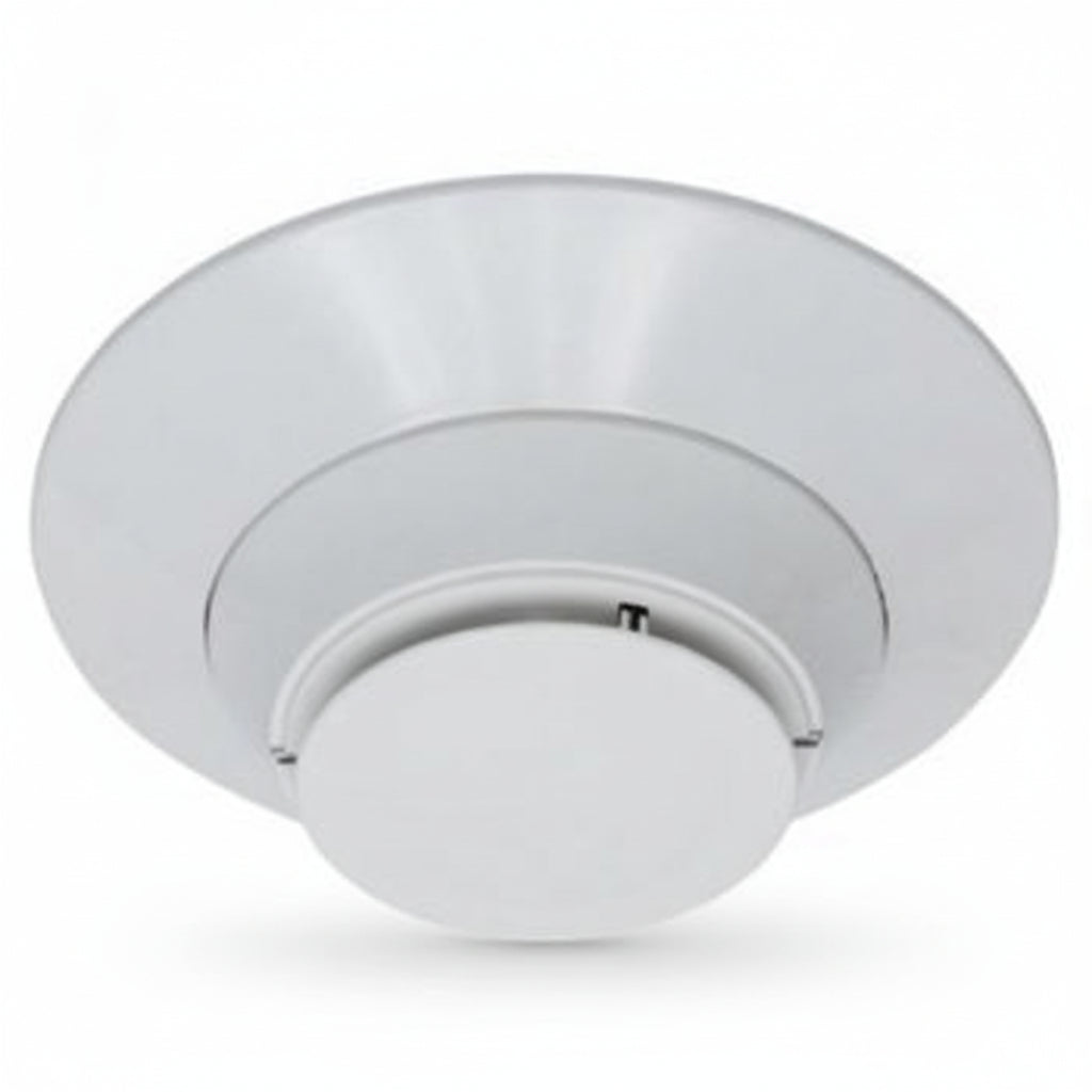System Sensor 2351B fire alarm detector mounted on ceiling, with a white circular design for residential or commercial use.