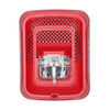 System Sensor SPSRL smoke detector with alarm test and silence button, mounted on ceiling in a commercial setting.