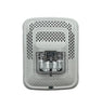 System Sensor SPSWL-P smoke and heat detector with built-in alarm, mounted on ceiling, for fire safety and monitoring.