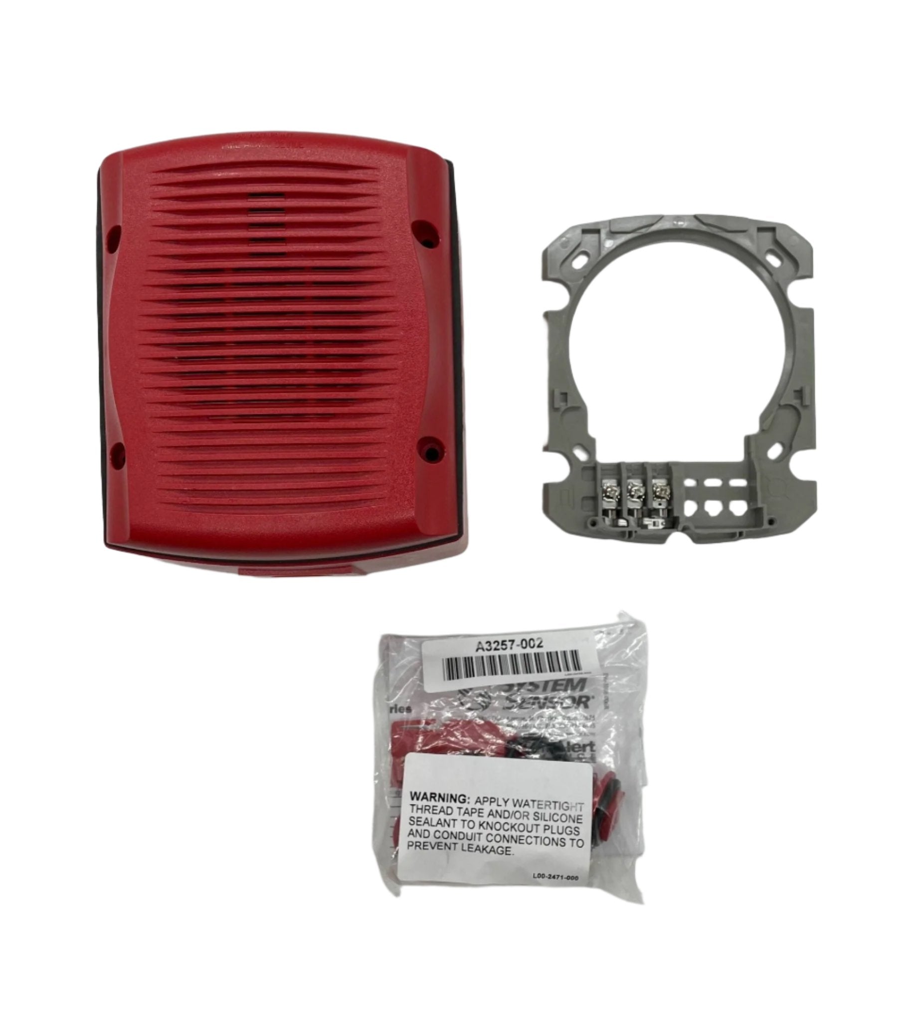 System Sensor SPRK fire alarm sensor mounted on ceiling, showcasing its sleek design and installation details.