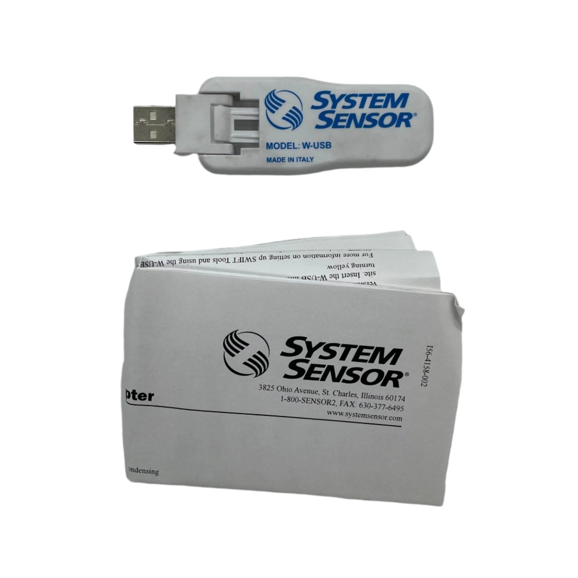 System Sensor W-USB device with USB connector, used for connection and communication in fire alarm and detection systems.
