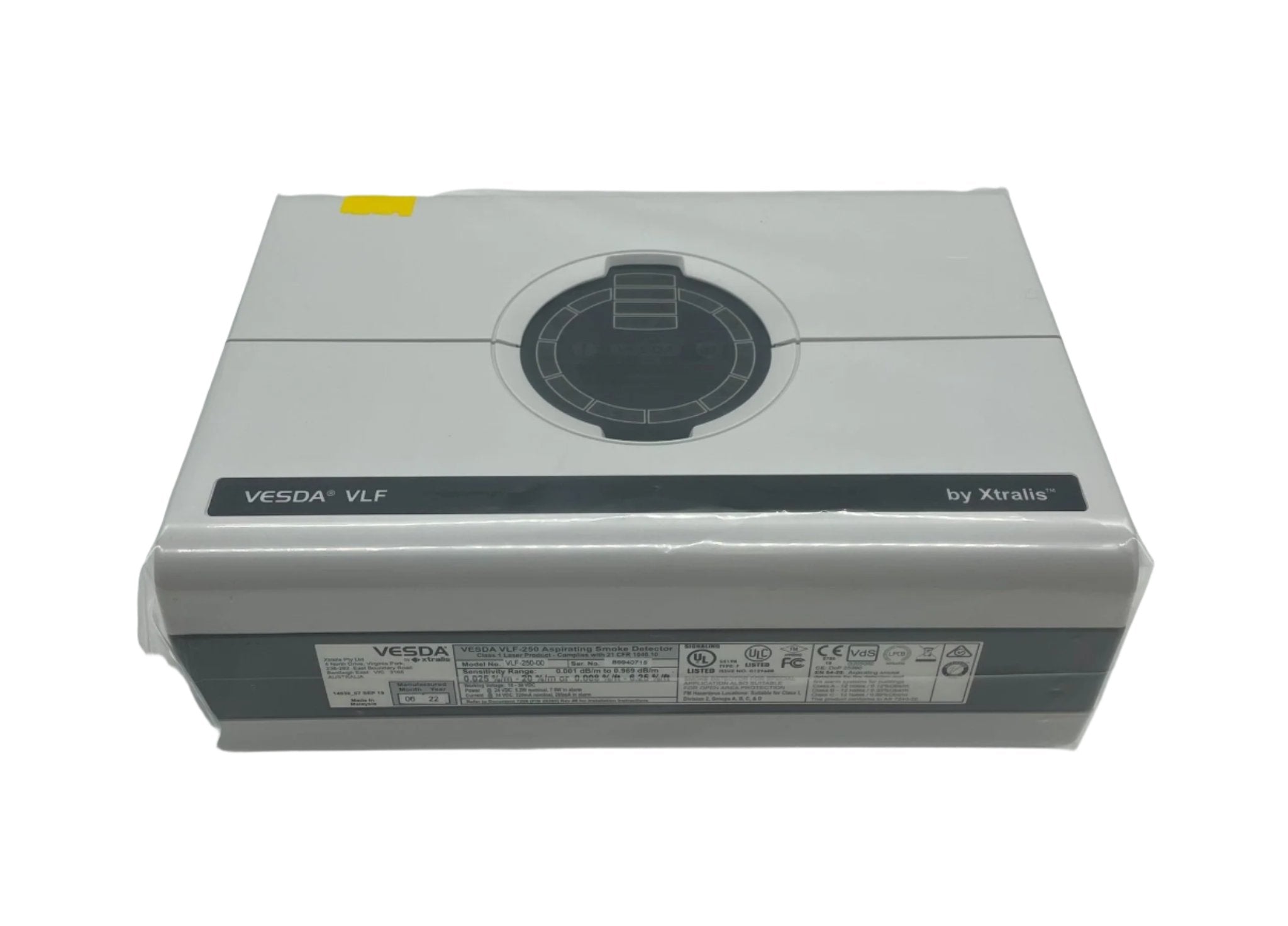 Vesda VLF-250-00 smoke detector mounted on ceiling, VESDA brand, designed for early fire detection in commercial spaces.