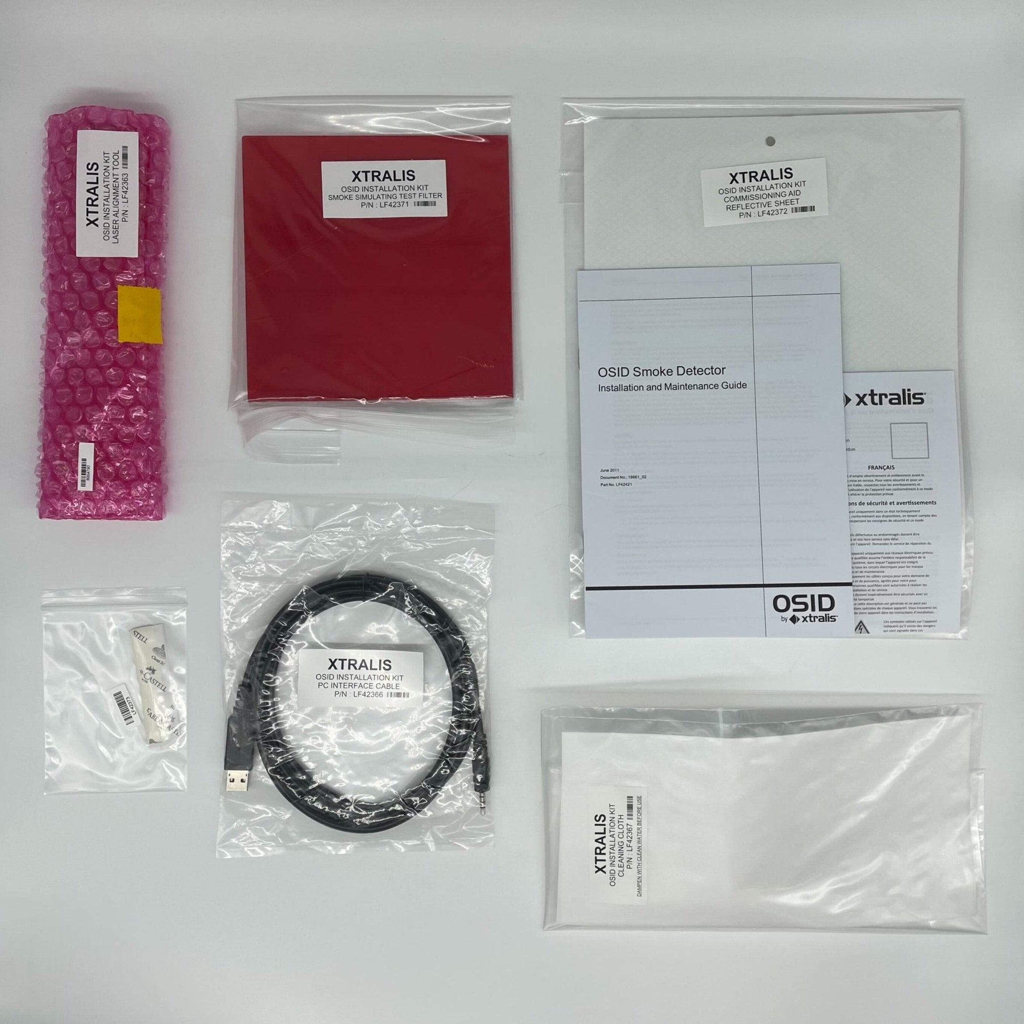Vesda OSID-INST fire alarm system sensor with ULC certification, mounted on wall in a fire safety setup.
